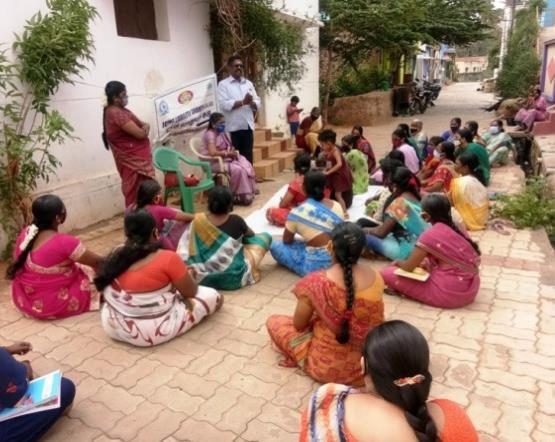 SMS women SHG meeting